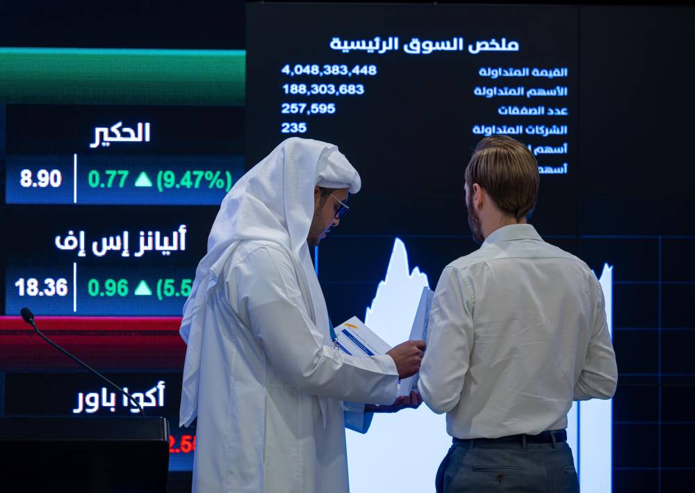 الأجانب يخفضون ملكيتهم في 111 ورقة مالية في ”تاسي” ويرفعونها في 102 أخرى