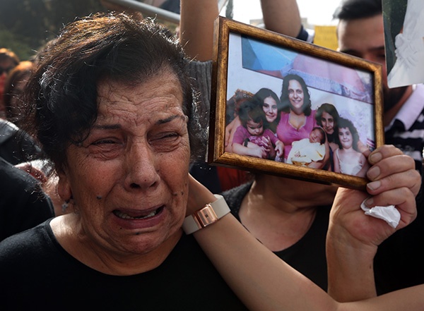 قصة مصورة : مظاهرة لبنانية ضد العنف الأسري