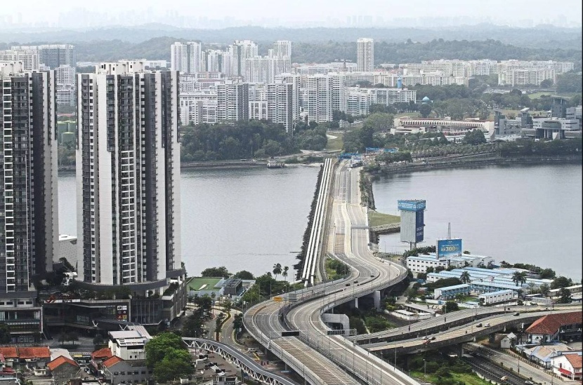 ماليزيا توقع على مشروع المنطقة الاقتصادية المشتركة مع سنغافورة في سبتمبر